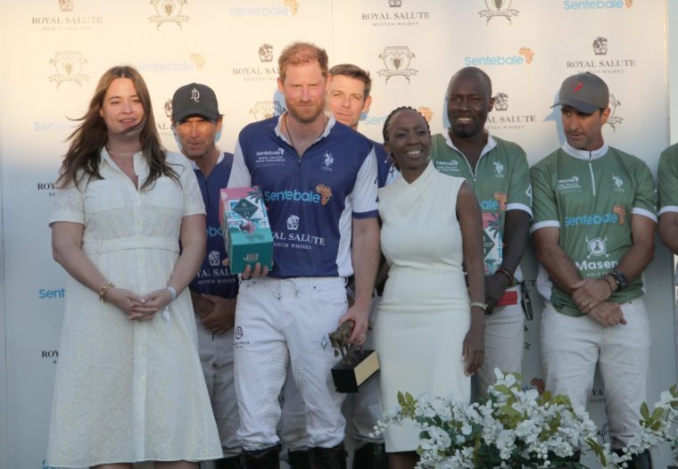 File photo dated 12/04/24 of the Duke of Sussex (centre) with Sentebale chairwoman Sophie Chandauka (centre right) during the awards ceremony after he played in a polo match during the Royal Salute Polo Challenge, to benefit Sentebale, at The USPA National Polo Center in Wellington, Florida, US. The Charity Commission said it has opened a case into 