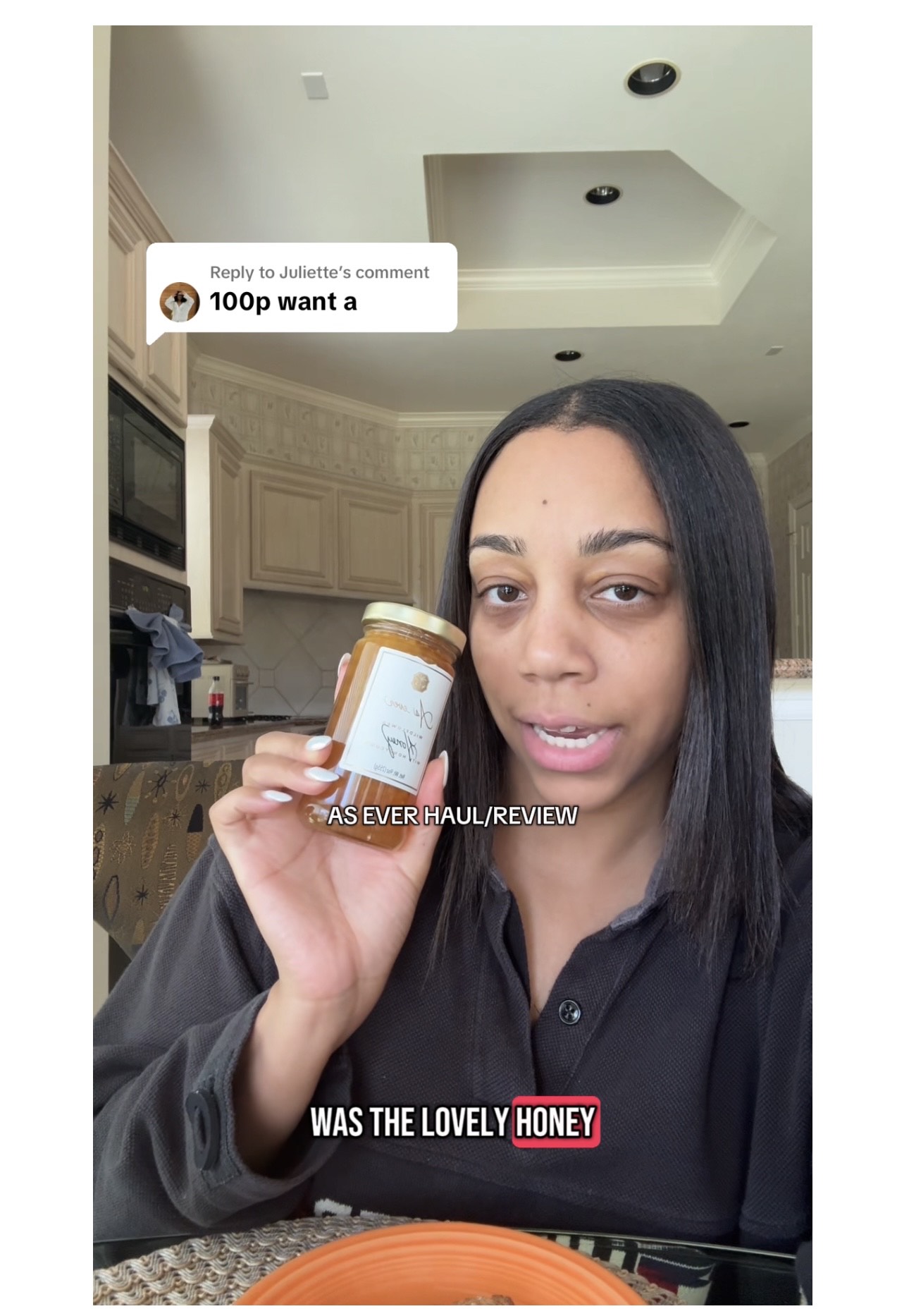 A woman holds up As ever honey in a screenshot from her Instagram
