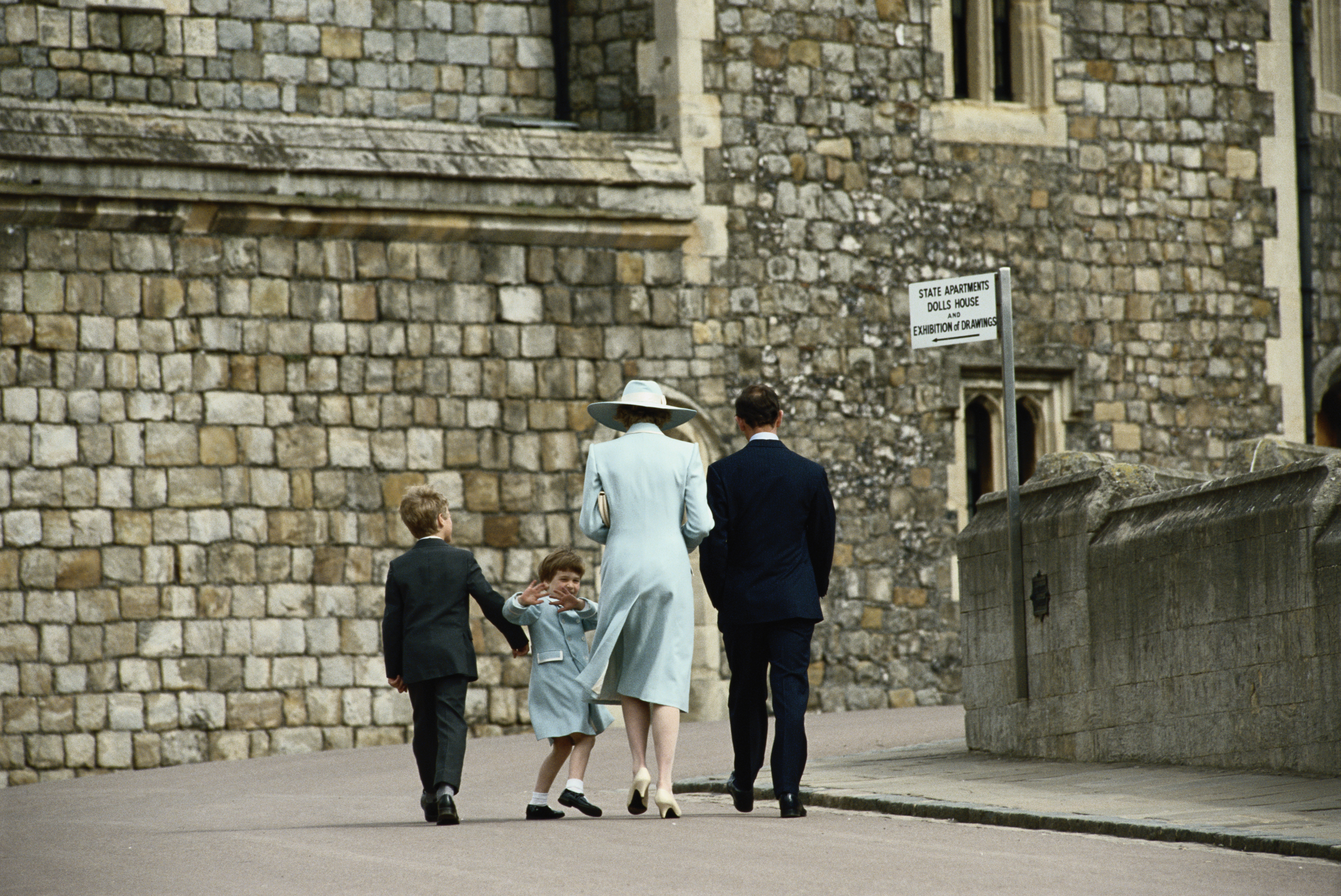 Peter Phillips, Prince William, Princess Diana and Prince Charles walking away from St. George's Chapel on Easter 1987