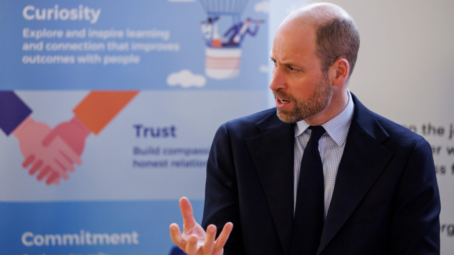Prince William Is Tired of “Too Much Talk,” Says He Wants to Make This Major Change When He’s King Prince William wearing a suit and tie and speaking at a meeting