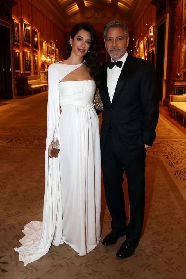 Amal and George Clooney at a Buckingham Palace dinner.
