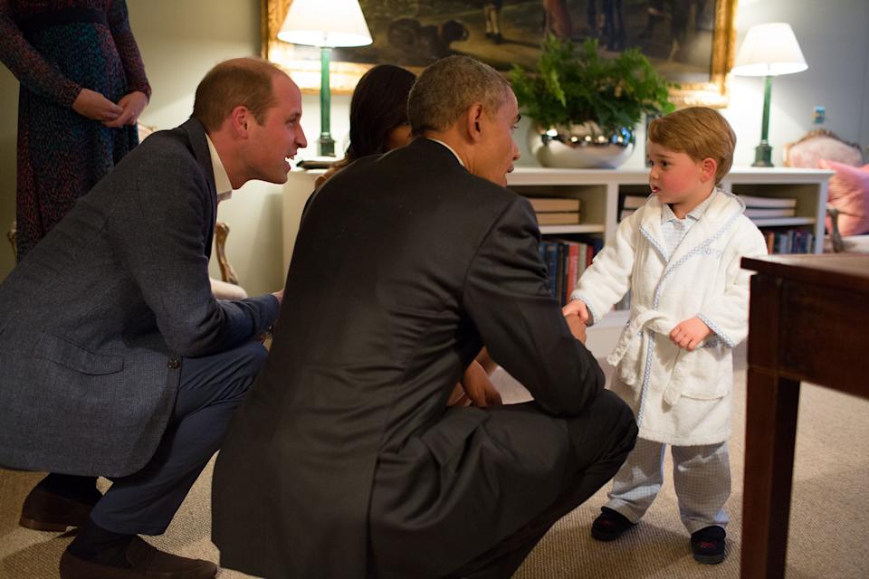Prince George famously met President Obama in the same PJs that Meghan is promoting now (Photo by Pete Souza/The White House via Getty Images) / The White House / Getty Images