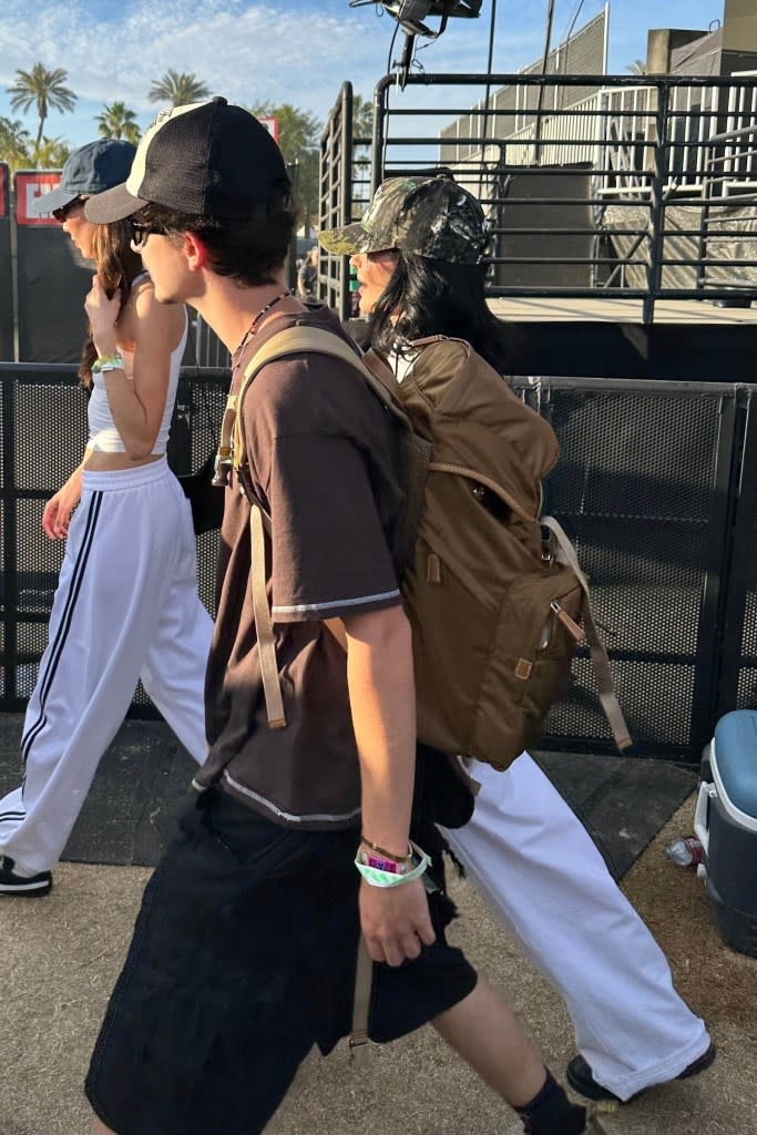 Jenner accessorized her look with a hat and purse. BACKGRID