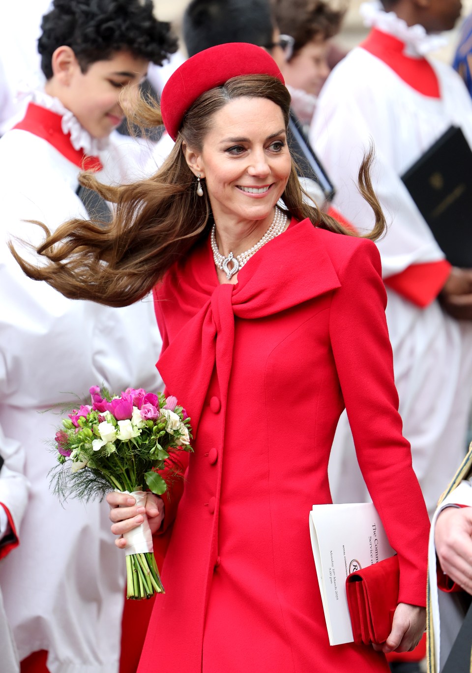 Catherine, Princess of Wales, smiling and departing Commonwealth Day celebrations at Westminster Abbey.