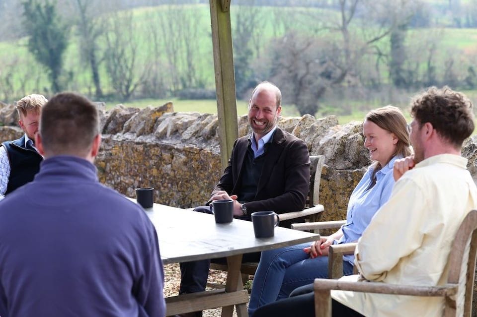 Prince William chatting with Young Farmers at Folly Farm