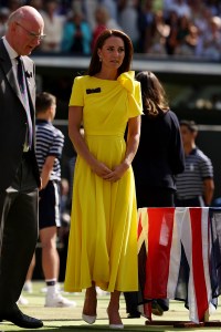 LONDON, ENGLAND - JULY 09: HRH Catherine, The Duchess of Cambridge walks out to present the trophy to Elena Rybakina of Kazakhstan after victory against Ons Jabeur of Tunisia during the Ladies' Singles Final match on day thirteen of The Championships Wimbledon 2022 at All England Lawn Tennis and Croquet Club on July 09, 2022 in London, England. (Photo by Julian Finney/Getty Images)