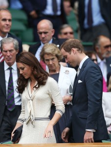 LONDON, ENGLAND - JULY 04:  Catherine, Duchess of Cambridge and Prince William, Duke of Cambridge leave the Royal Box on Centre Court as rain delays play during day nine of the Wimbledon Lawn Tennis Championships at the All England Lawn Tennis and Croquet Club on July 4, 2012 in London, England.  (Photo by Clive Rose/Getty Images)
