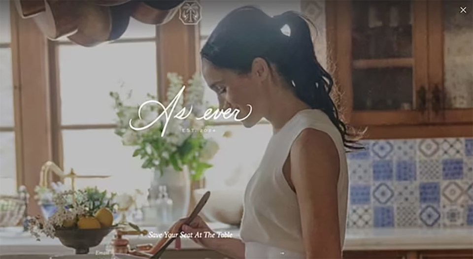 Meghan Markle in a kitchen, cooking.