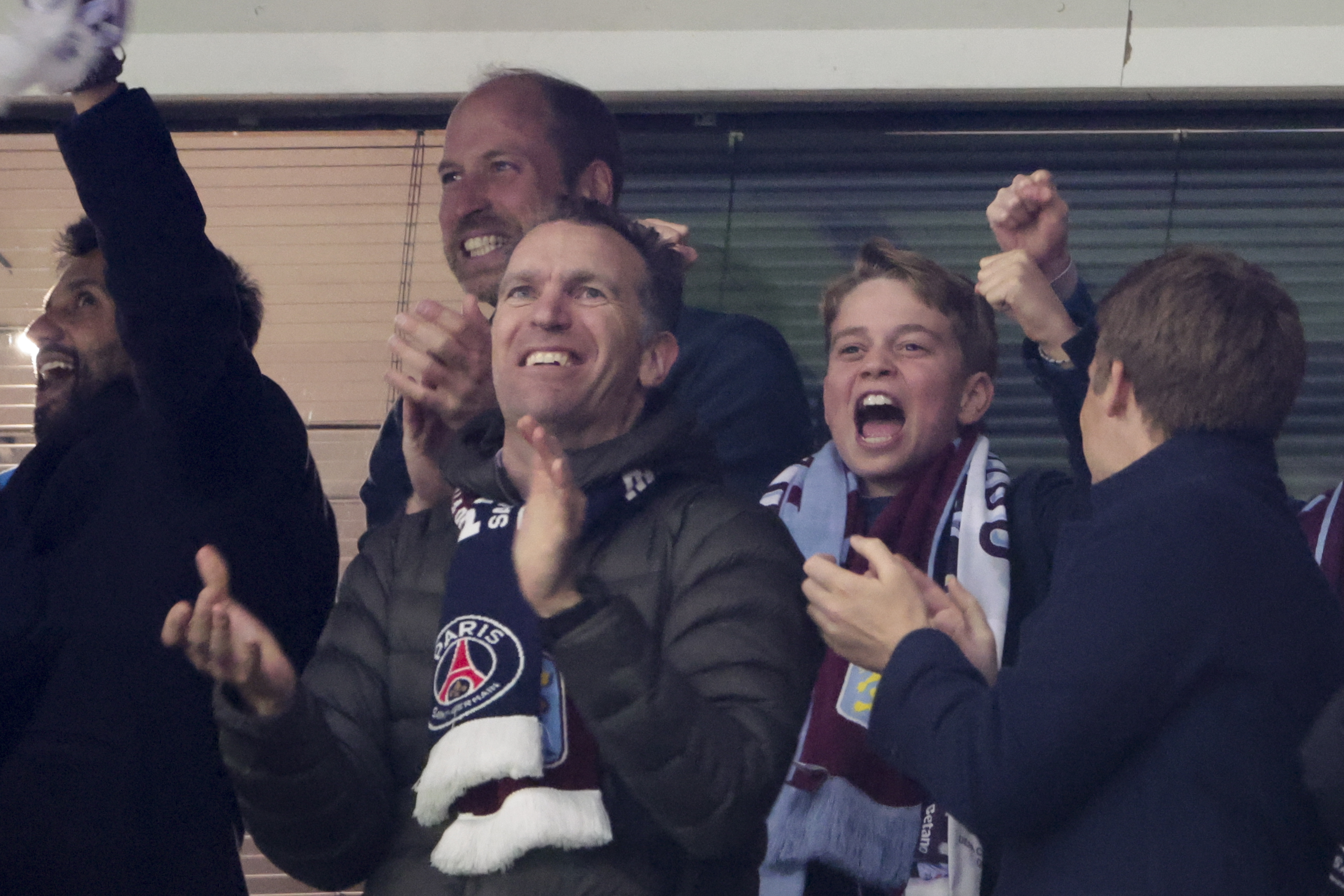 Prince William and Prince George in the stands at an Aston Villa match