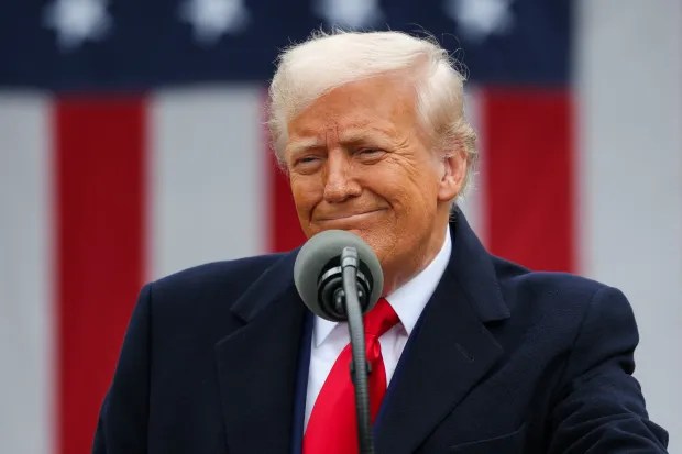 Donald Trump at a podium.