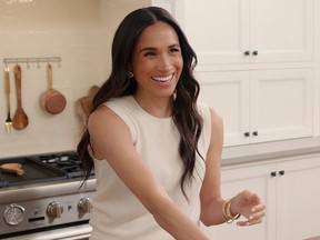 Meghan, Duchess of Sussex smiling in production shot from Episode 5 of With Love, Meghan.