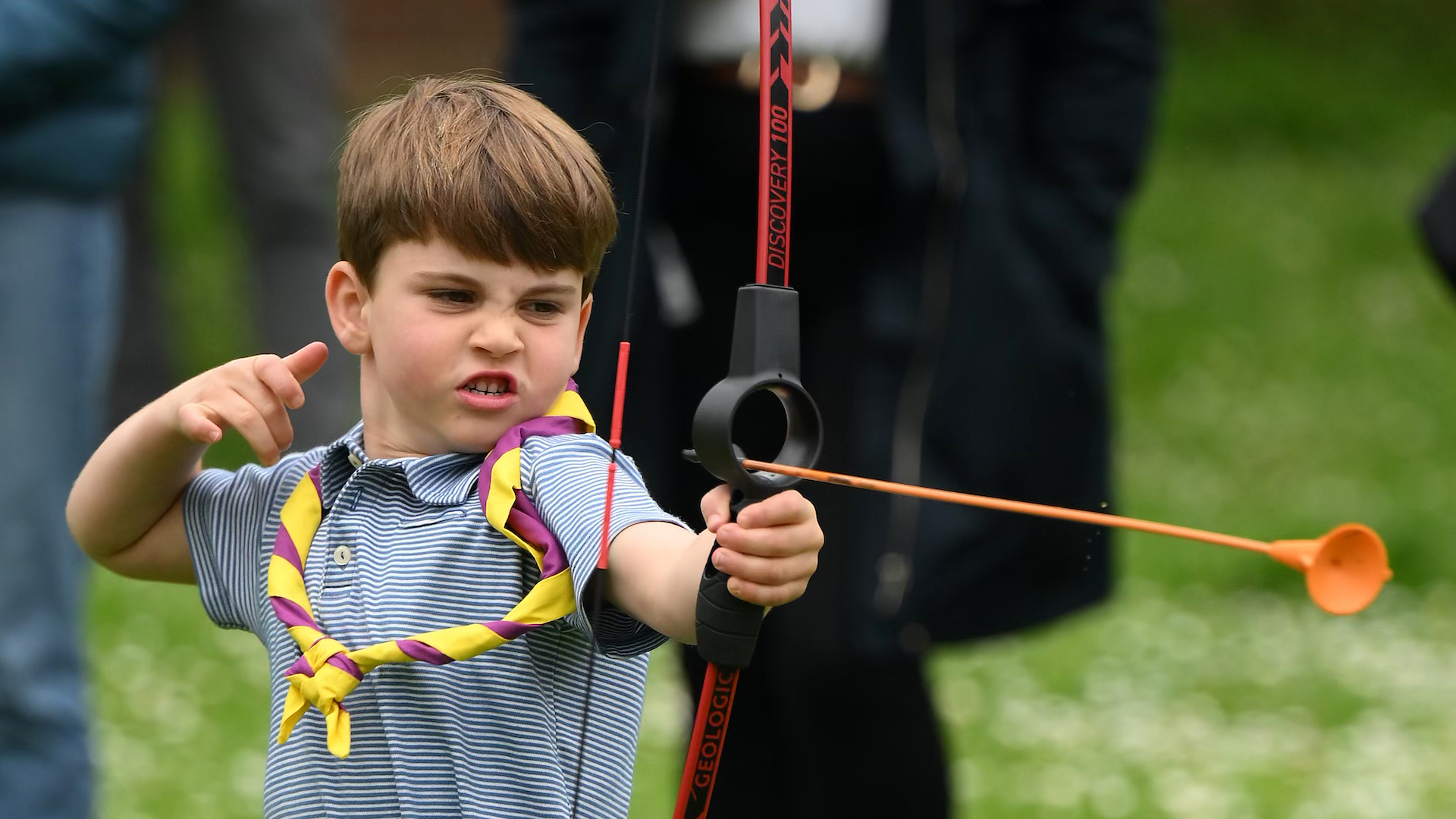 Prince Louis of Wales tries his hand at archery while taking part in the Big Help Out, during a visit to the 3rd Upton Scouts Hut in Slough on May 8, 2023 in London, England
