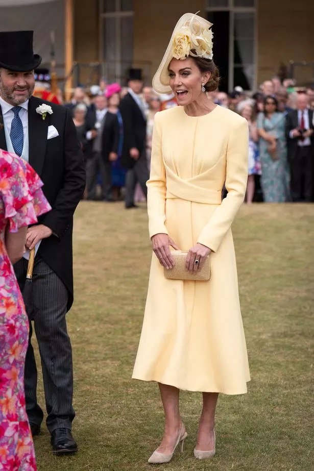 LONDON, ENGLAND - MAY 20: Catherine, Princess of Wales greets guests during a Royal Garden Party at Buckingham Palace on May 20, 2025 in London, England. (Photo by Aaron Chown - WPA Pool / Getty Images)