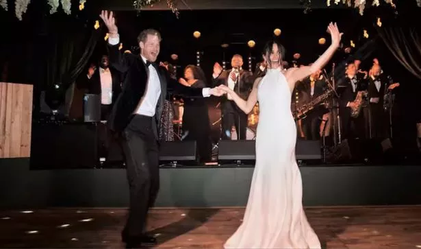 Harry and Meghan at their wedding reception
