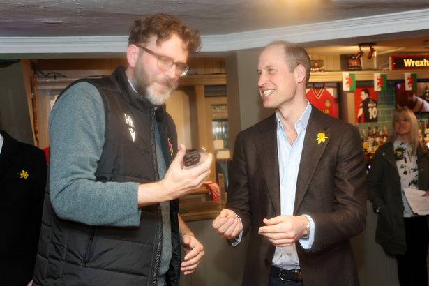 Wrexham director Humphrey Ker catches up with Prince William at the Turf pub