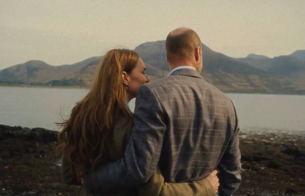 The pair hug as they admire the landscape on the Isle of Mull last month