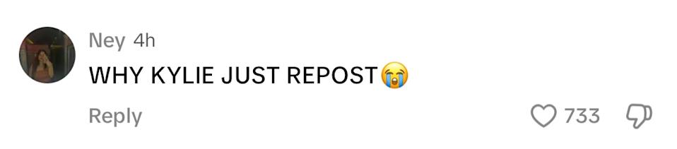 Comment questioning why Kylie reposted, with crying emoji. 733 likes and multiple replies