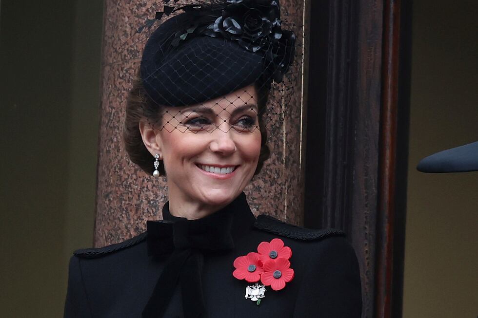 Britain's Kate, Princess of Wales, stands on a balcony during the National Service of...