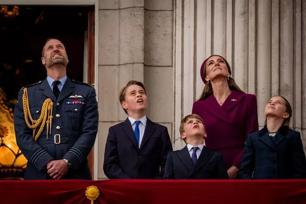The Prince of Wales, Prince George, the Princess of Wales, Prince Louis and Princess Charlotte on the balcony of Buckingham Palace, London