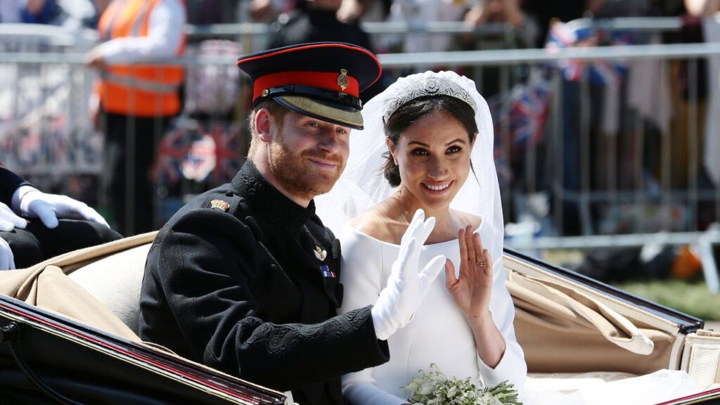 A warning from Queen Elizabeth and a bribe for the Wales children: Meghan Markle’s wedding photographer reveals how he got the perfect shot at the Duke and Duchess of Sussex’s nuptials