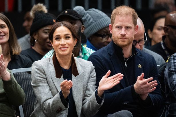 Harry and Meghan watching the Invictus Games