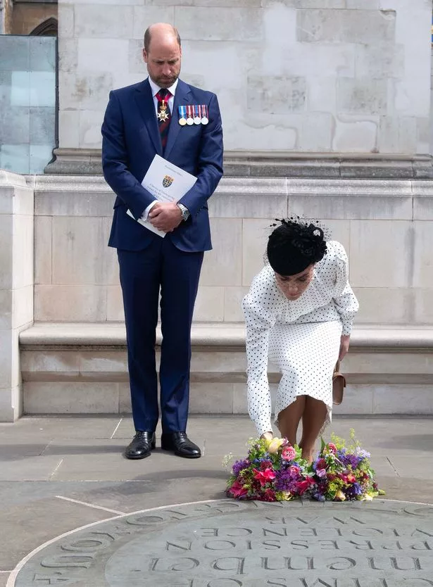 Kate placed her flowers at the large circular slate Innocent Victims’ Memorial outside the abbey