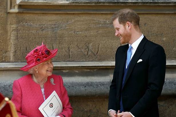 Prince Harry with his late grandmother the Queen