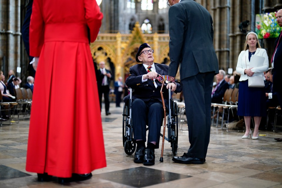 Veteran in wheelchair at Westminster Abbey VE Day service.