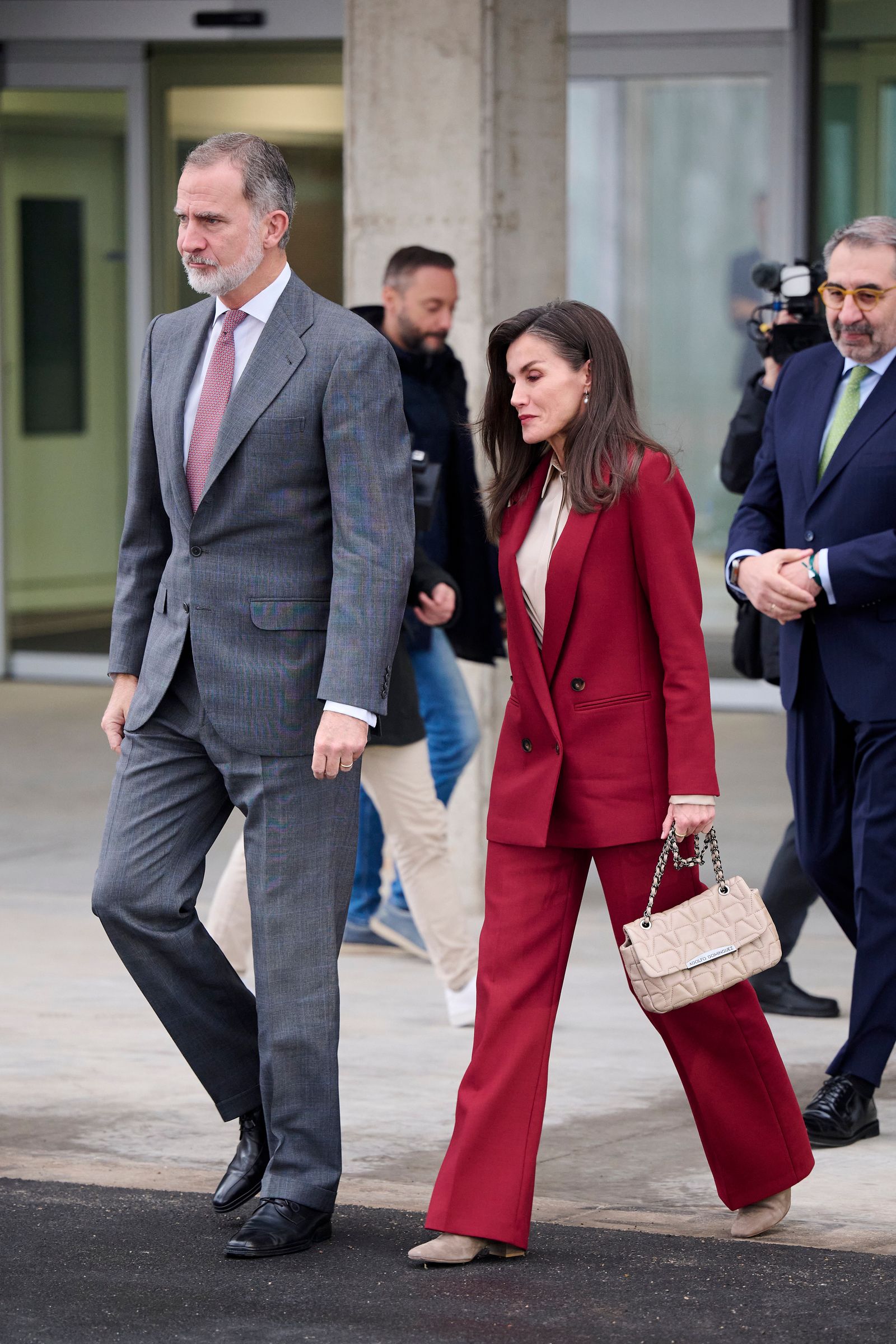 Image may contain Felipe VI of Spain Clothing Formal Wear Suit Accessories Bag Handbag Blazer Coat and Jacket