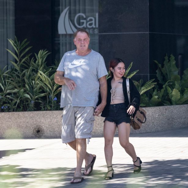 Thomas Markle Jnr. was spotted holding hands with a woman as he left the apartment 