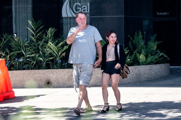 Thomas Markle Jnr, 58, seen leaving his home in Cebu with a young woman