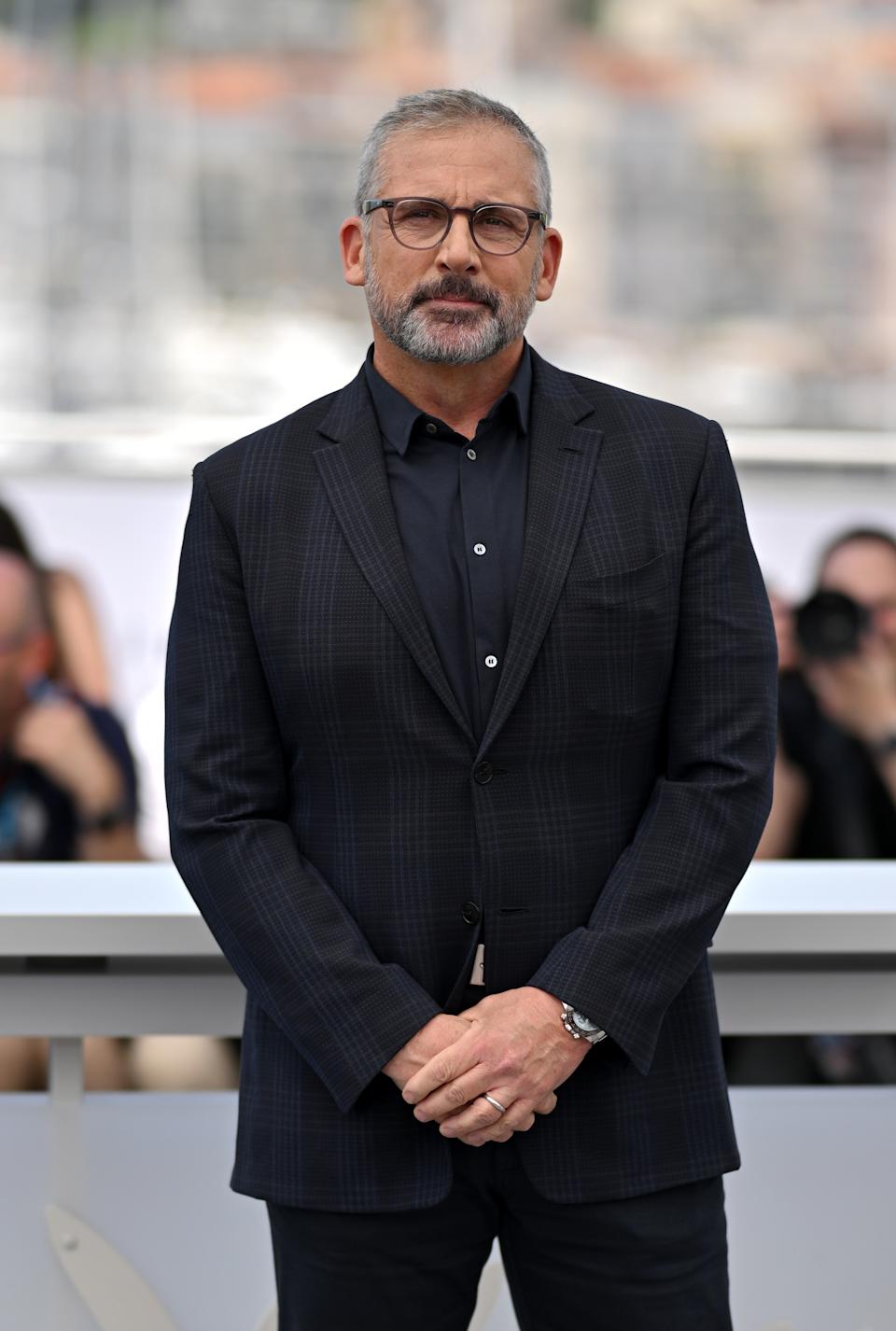 Steve Carell standing outside at a formal event
