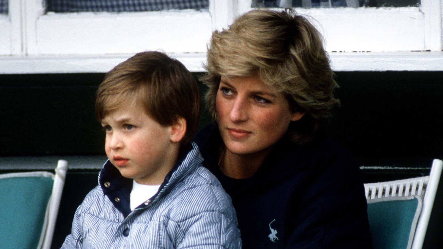 Prince William sits on Princess Diana's lap in 1987