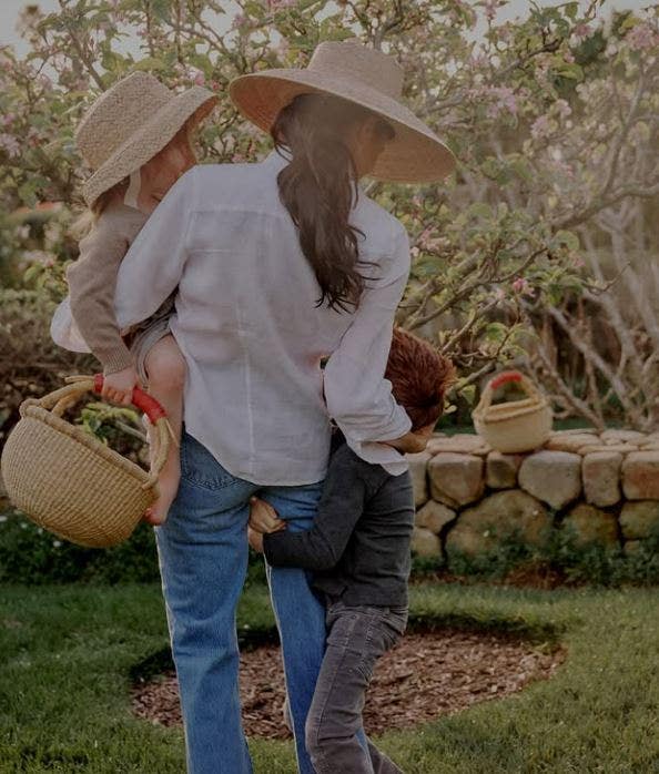 Markle with her kids in her garden