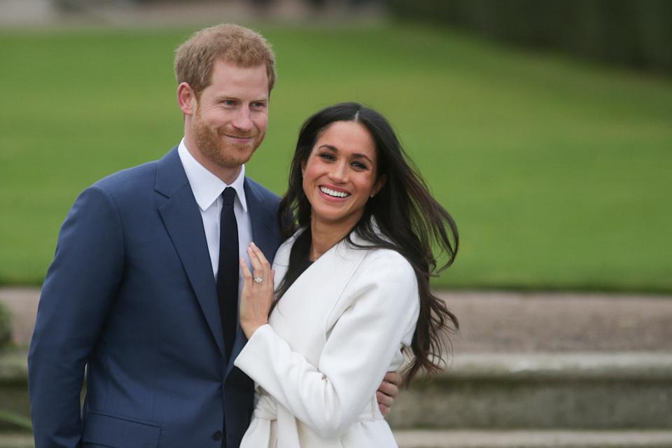 Prince Harry and Meghan Markle announced their royal engagement in 2017 and got married in 2018. / DANIEL LEAL / Daniel Leal/AFP via Getty Images