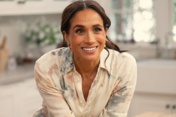 Meghan Markle smiling at the camera during her With Love, Meghan Netflix series