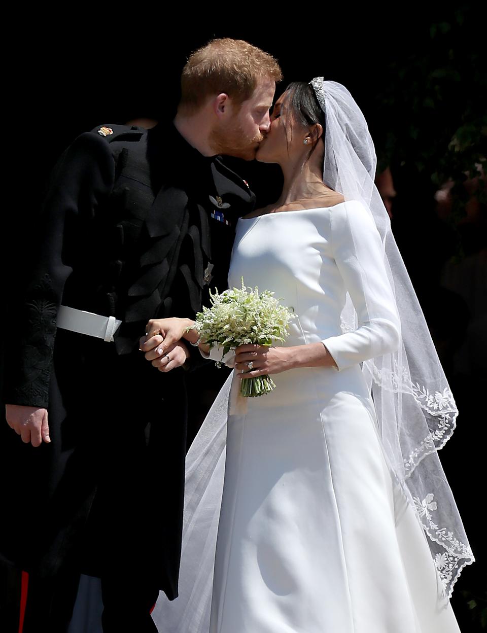 Prince Harry and Meghan Markle kissing on their wedding day