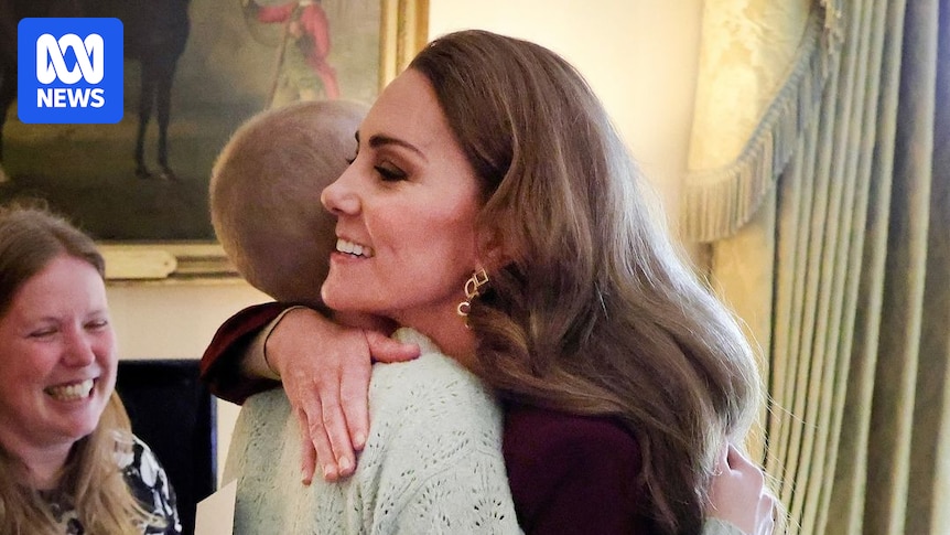 Princess Catherine hugs cancer patient in first photograph of her returning to work after chemotherapy Princess Catherine hugs cancer patient in first photograph of her returning to work after chemotherapy