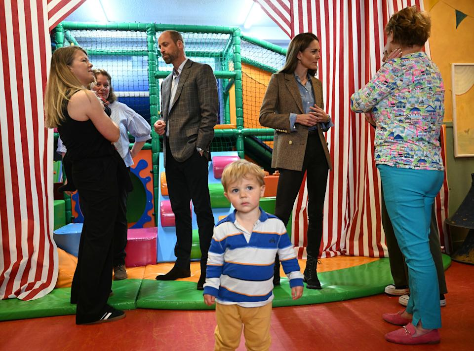Prince William, Prince of Wales and Britain's Catherine, Princess of Wales react during a visit to a soft play area at Aros Hall, a local community hub on April 29, 2025 in Tobermory, Scotland.