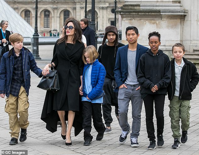 Pax said in the rant that Brad makes his four youngest children 'tremble in fear.' All six of their children - Pax, 19, Maddox, 23, Zahara, 18, Shiloh, 18, and twins Knox and Vivienne, 16, are pictured with Angie in 2018