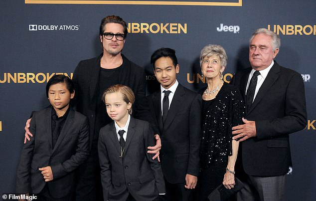 None of the couple's shared children have been pictured with their father in recent years (pictured (L-R) Pax Thien Jolie-Pitt, Shiloh Nouve Jolie-Pitt, actor Brad Pitt, Maddox Jolie Pitt, Jane Pitt and William Pitt in 2014)