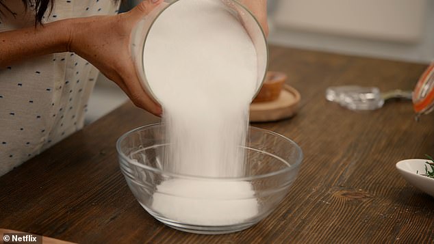 Markle failed to measure the ingredients of her bath salt recipe, prompting one of her crew members to ask from off-camera, 'Is there a certain amount of salt that I'm dealing with here?'