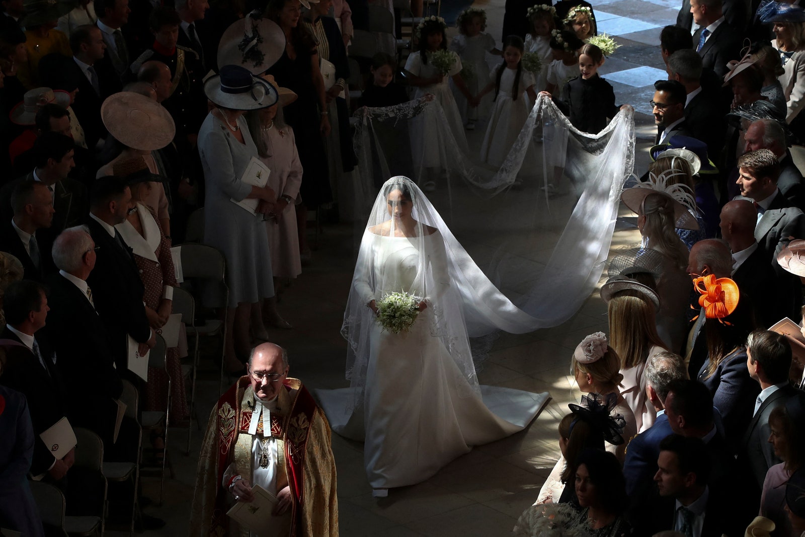 Image may contain Meghan Duchess of Sussex Clothing Dress Fashion Formal Wear Gown Wedding Wedding Gown and Adult