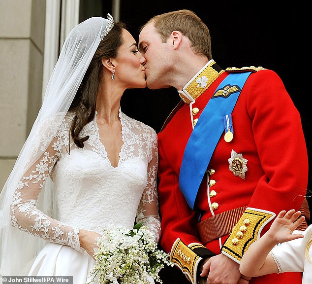 Kate and William are pictured on the balcony of Buckingham Palace following their wedding ceremony in Westminster in April 2011