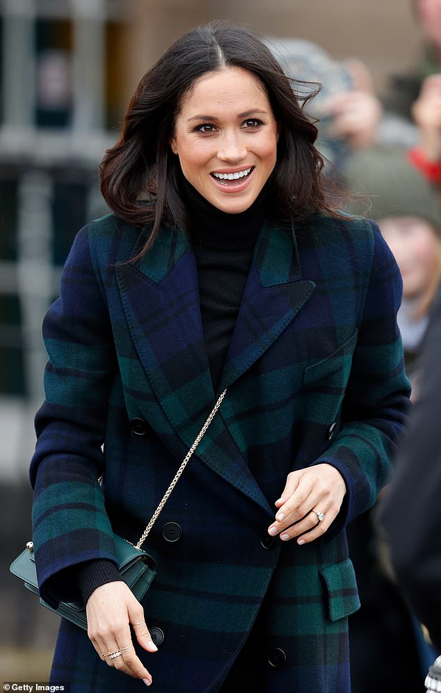 Meghan Markle certainly looked the part in her tartan coat when visiting Edinburgh, but we had never seen a Royal on a walkabout with a crossover bag before, so this was a first
