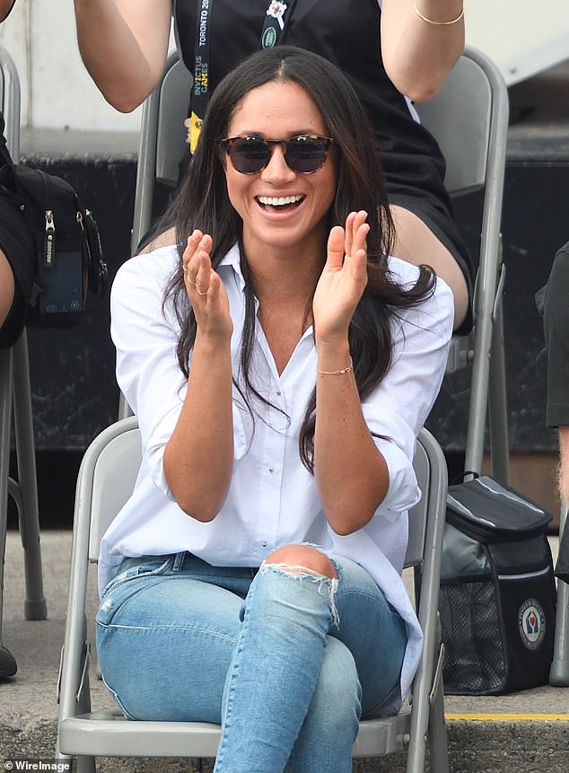 The appearance of Meghan Markle with Prince Harry at the Toronto Invictus games made news around the world as together with the ripped jeans she wore a "Husband Shirt," from designer Misha Nonoo