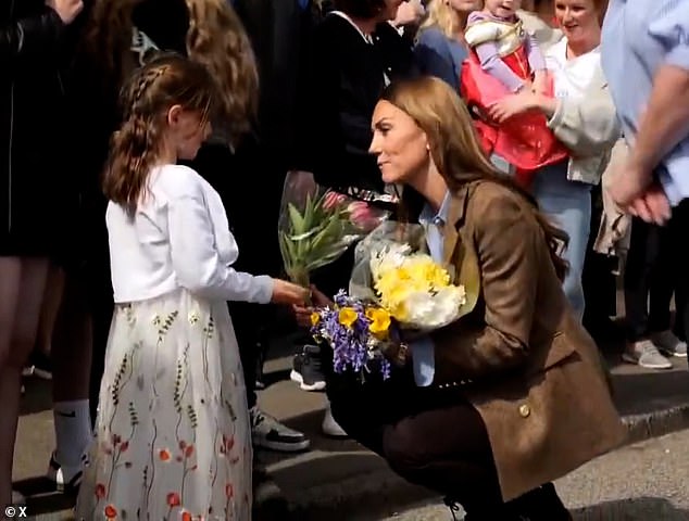 After guiding Iris through the crowd, her dream came true and she was able to give her bouquet to the princess
