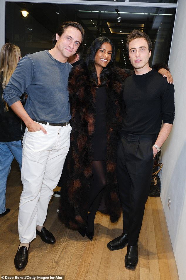 Pictured; Constantin "Tino" Klein, Simone Ashley and Marco Capaldo attend the exhibition opening of "Memories of the Future", curated by Marco Capaldo, on October 03, 2024 in London, England