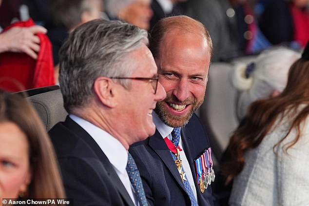 William (pictured) chuckled as he chatted with Sir Keir, the Prime Minister, who he sat next to