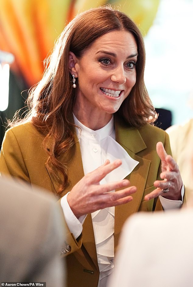 Wearing her chocolate tresses down in loose waves, Kate also opted for a glamorous make-up look with smokey eyes and a dusky pink lip